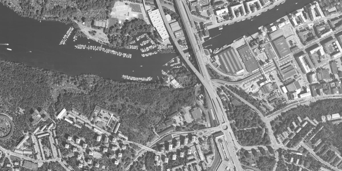Svartvit flygbild över Årstaviken i Stockholm